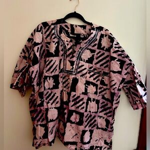 Selling an oversized large African shirt. Purple/ lavender with handy details.